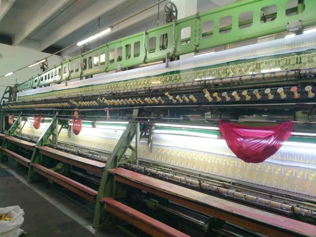 Schiffli embroidery loom running at Al-Haram Enterprises, Multan